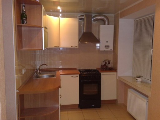 Comment cacher un geyser dans la cuisine : les meilleures façons de se déguiser + les exigences de sécurité