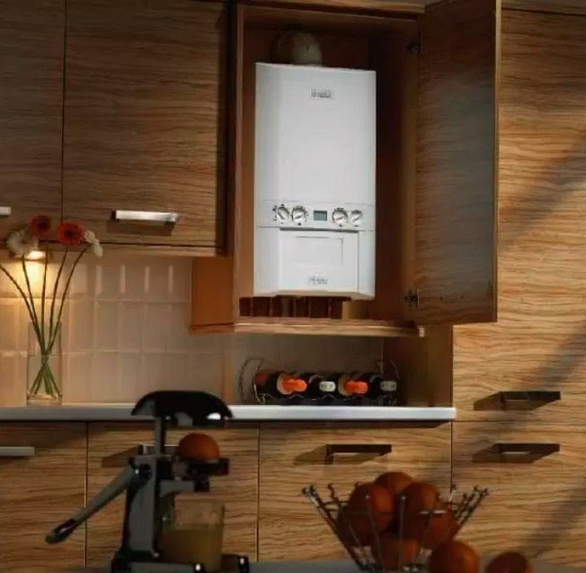 Comment cacher une chaudière à gaz dans la cuisine: les meilleures options de conception et astuces de déguisement
