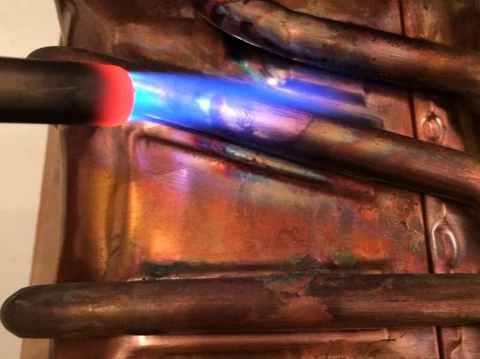 Remplacement d'un geyser dans un appartement : documentation du remplacement + normes et exigences de base