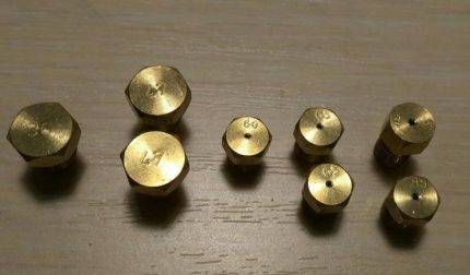 Conversion d'une cuisinière à gaz en gaz en bouteille : comment réorganiser les buses pour qu'elles fonctionnent avec du carburant liquéfié