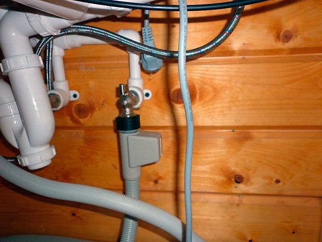 Comment intégrer un lave-vaisselle dans une cuisine finie : options + flux de travail