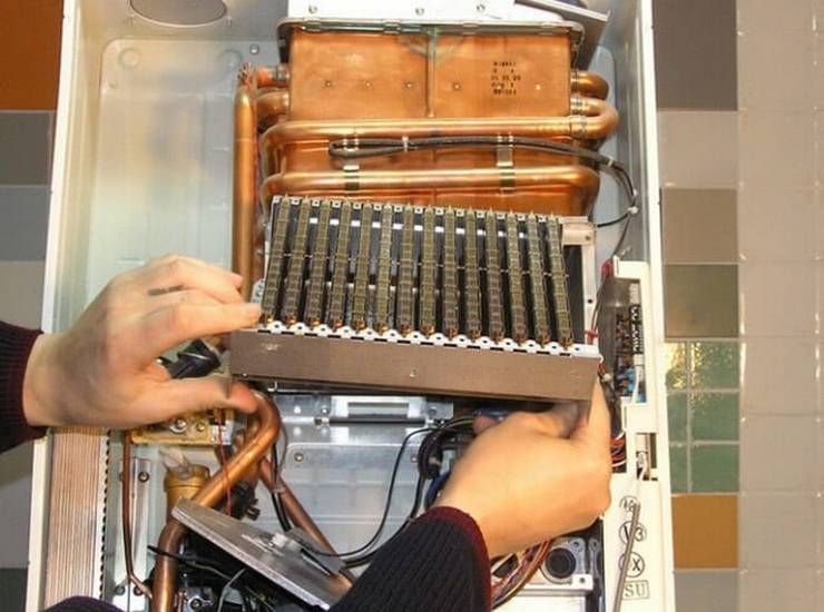 Comment nettoyer le geyser de vos propres mains en rinçant l'échangeur de chaleur