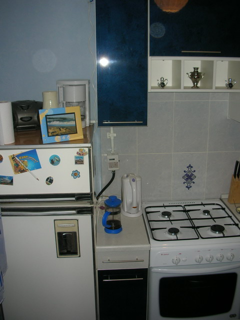 Comment accrocher une hotte sur une cuisinière à gaz : à quelle hauteur et distance