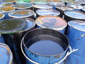 Caractéristiques de l'agencement du chauffage à l'huile usée à l'aide de poêles et de chaudières