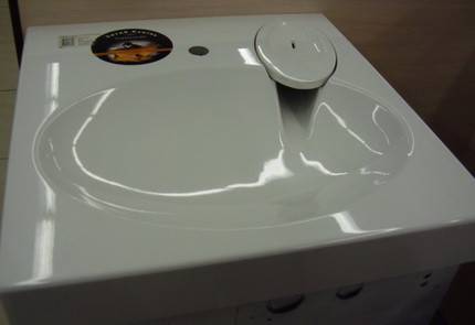 Les nuances de l'installation d'un évier sur une machine à laver: un exemple de travail étape par étape