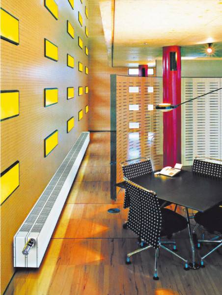 Radiateurs de chauffage en fonte : caractéristiques des batteries, leurs avantages et inconvénients