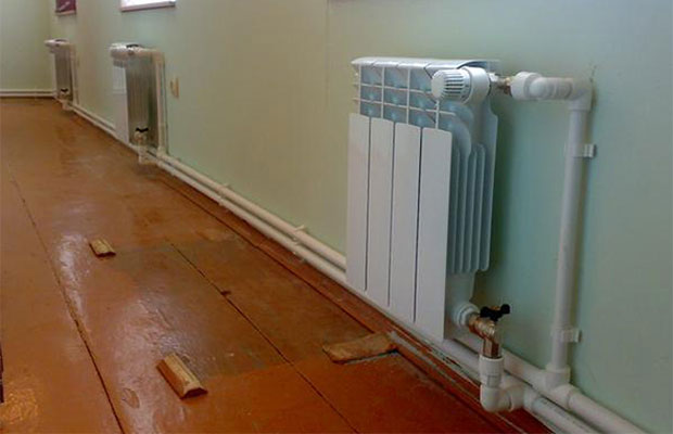 Schémas et règles typiques pour la rédaction d'un système de chauffage pour une maison privée à un étage