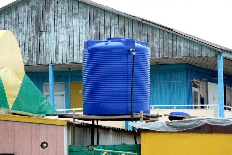 Comment construire une douche d'été chauffée dans un chalet d'été?