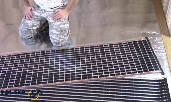 Chauffage au sol sous stratifié sur un sol en béton : nuances de design + notice de pose détaillée