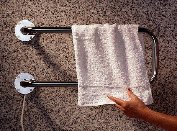 Installation et raccordement d'un sèche-serviettes - analyse de la technologie de travail