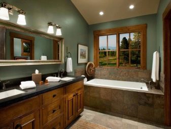 Caractéristiques de l'aménagement d'une salle de bain dans une maison en bois