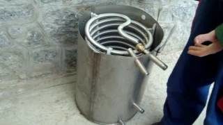 Échangeur de chaleur à air à faire soi-même sur la cheminée: exemples de fabrication et conseils des maîtres