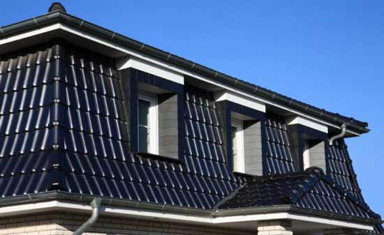 Installation à faire soi-même de gouttières métalliques pour un toit : analyse des technologies + exemple d'installation