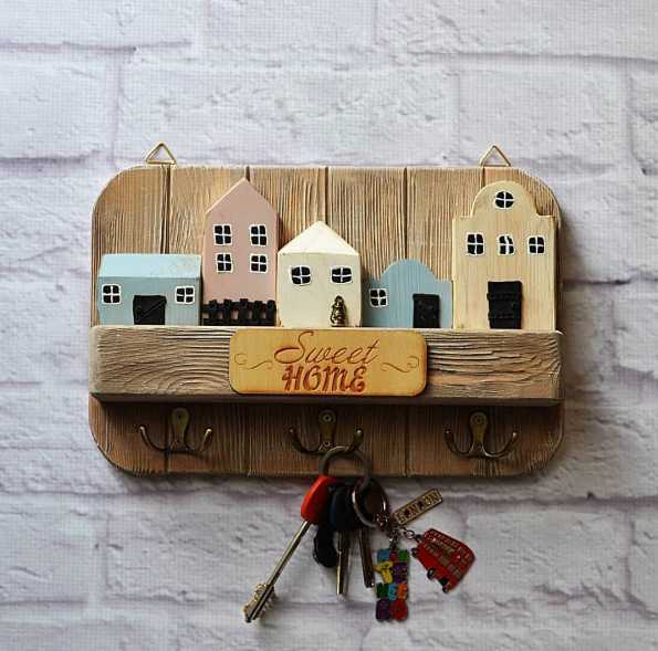 Comment faire une femme de ménage murale de vos propres mains? 