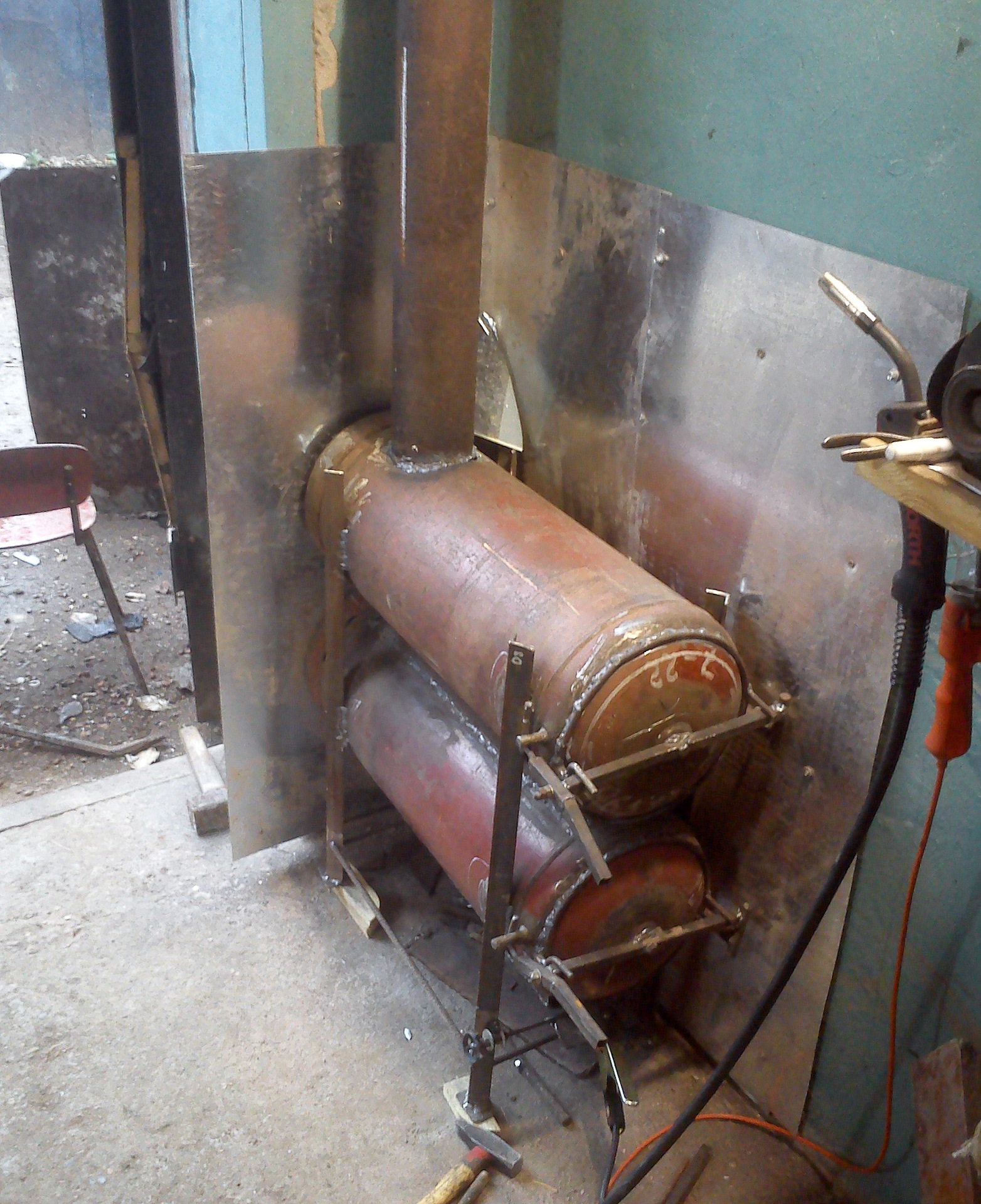 Comment fabriquer soi-même une cuisinière à partir d'une bouteille de gaz: un schéma, des instructions pas à pas avec une vidéo, etc.