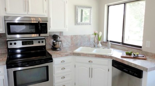 Placement de la cuisinière à gaz par rapport aux communications : gaz et électricité