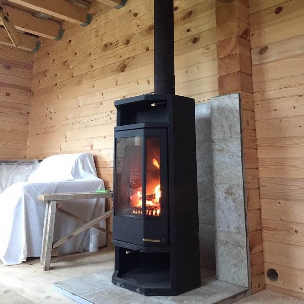 Choisir un poêle à combustion longue pour une résidence d'été et une maison de campagne: types, principales caractéristiques