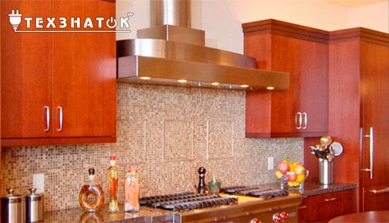 Hauteur d'installation de la hotte au-dessus de la cuisinière à gaz et électrique : normes généralement acceptées