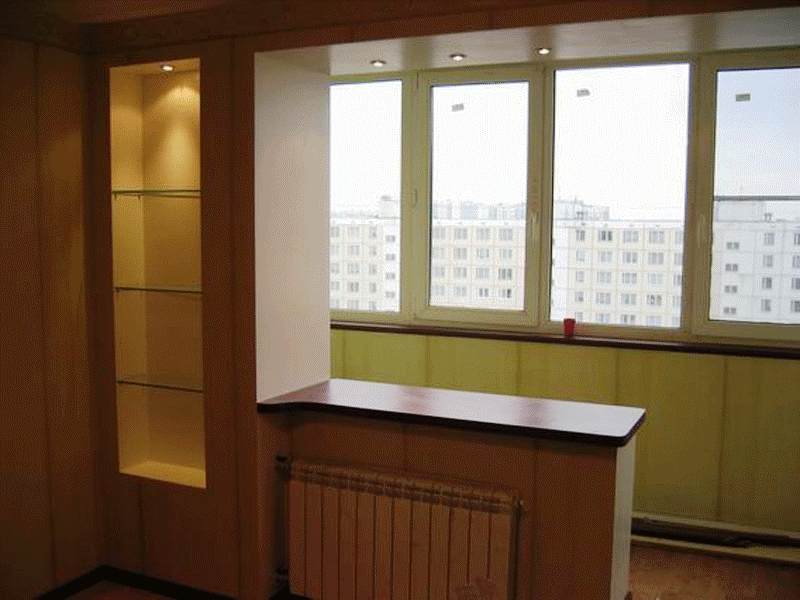 Combinaison d'un balcon (loggia) avec une cuisine, une chambre