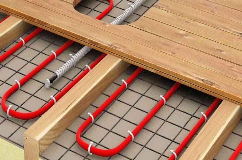 Pose d'un sol chaud sous carrelage sur parquet, choix d'un système de chauffage