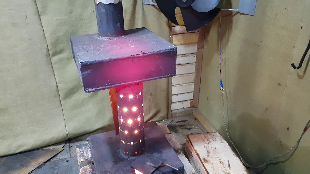 Four à faire soi-même pour s'entraîner pour un garage: comment fabriquer un poêle fait maison dans un garage