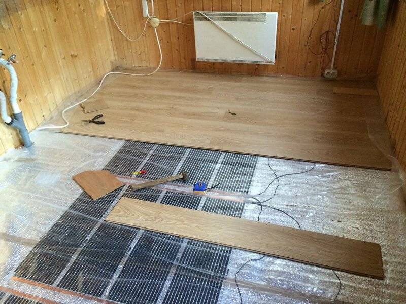 Chauffage au sol sous stratifié sur un parquet - notice de pose