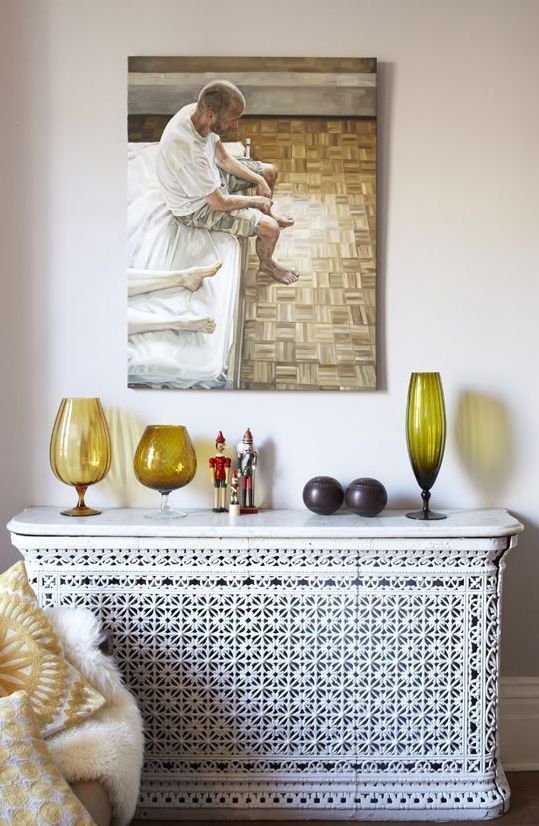 Écrans décoratifs pour radiateurs - le meilleur moyen de masquer leurs défauts