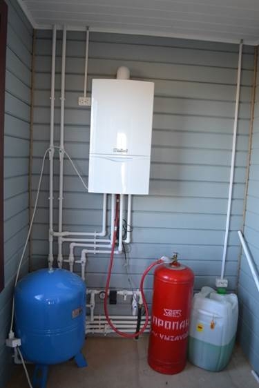 Chaudière au gaz propane: caractéristiques de l'équipement, consommation de carburant pour le carburant en bouteille AOGV