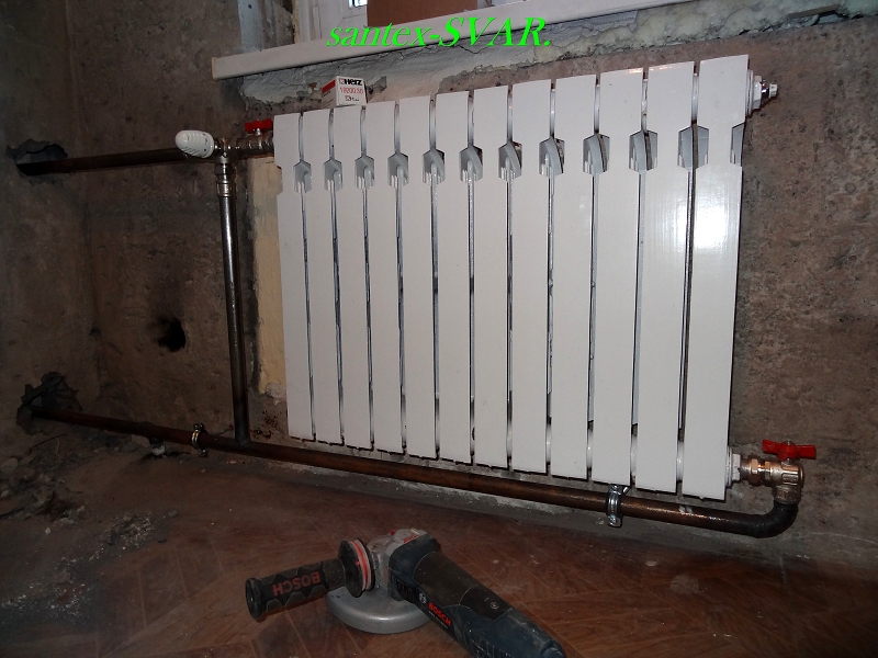 Pose de robinets sur radiateurs