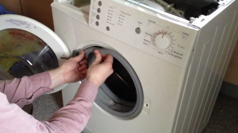 Comment changer le roulement sur la machine à laver Indesit: instructions étape par étape