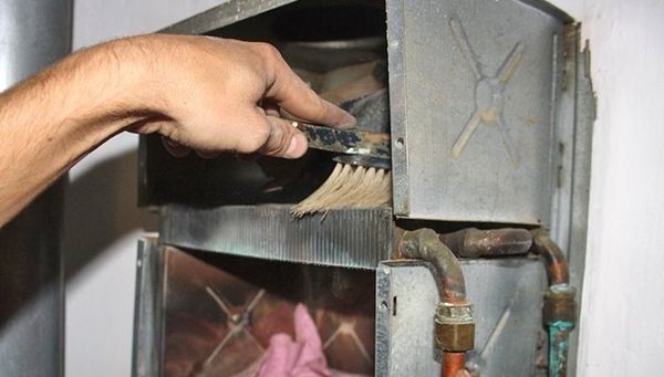 Réparation d'échangeur de chaleur à colonne de gaz à faire soi-même