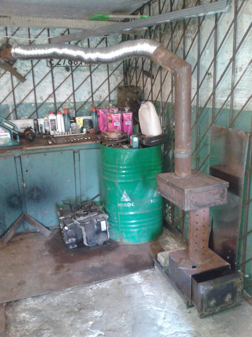 Poêle Potbelly dans le garage: comment l'installer de vos propres mains, dessins