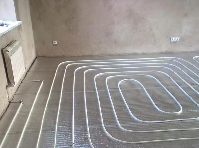 Pose des tuyaux de chauffage au sol : pose + comment choisir une étape et faire un circuit moins cher