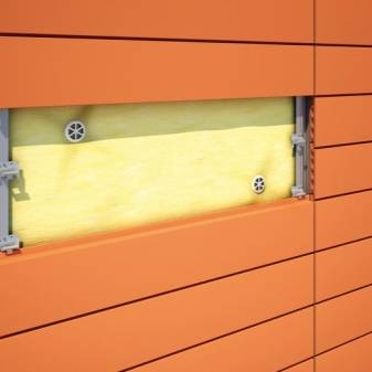 Comment recouvrir une maison en bois de l'extérieur: les meilleurs types de matériaux et leurs technologies d'installation