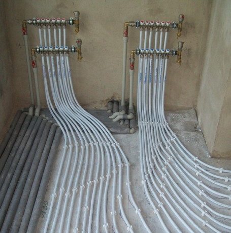 Conception et installation d'un système de chauffage à collecteur