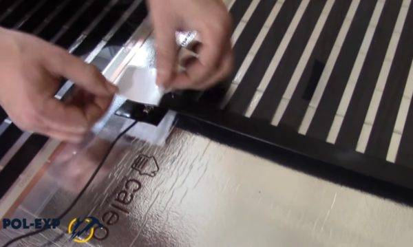 Chauffage au sol sous stratifié sur un sol en béton : nuances de design + notice de pose détaillée