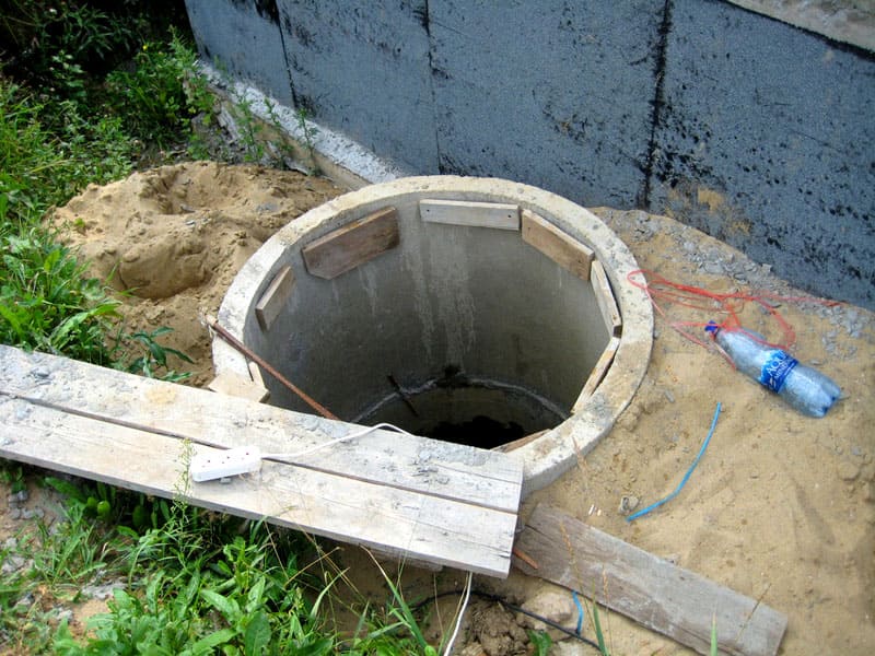 Remplacement de la charpente du puits par des anneaux en béton - constructeur