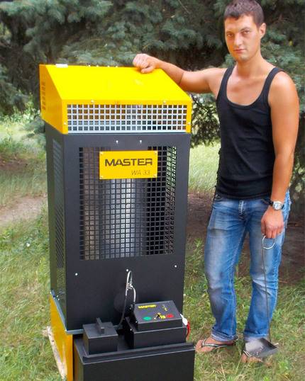 Caractéristiques de l'agencement du chauffage à l'huile usée à l'aide de poêles et de chaudières