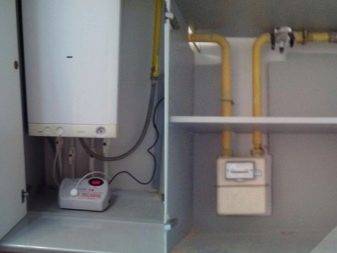 Comment cacher une chaudière à gaz dans la cuisine: les meilleures options de conception et astuces de déguisement