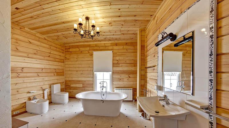 Salle de bain dans une maison en bois: règles d'aménagement et finitions