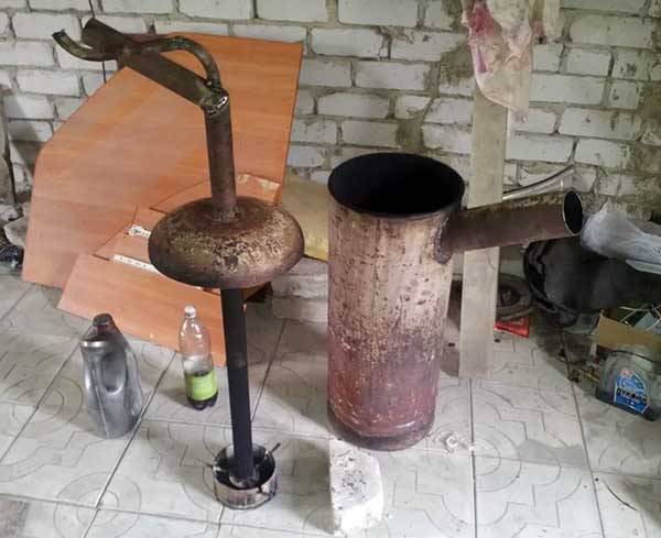 Comment construire un poêle à ventre avec de l'huile usée: instructions sur photos et dessins