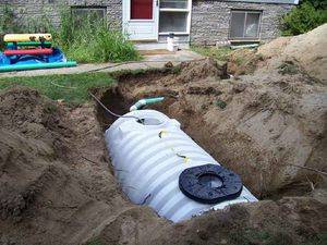 Comment un puisard est construit dans une maison privée: un aperçu des structures + des règles pour leur disposition