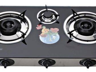 Pourquoi avez-vous besoin d'un tiroir inférieur dans une cuisinière à gaz: façons d'utiliser une palette carrelée