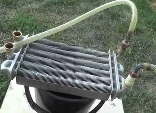Rinçage de l'échangeur de chaleur de la chaudière à gaz: méthodes de nettoyage et moyens d'élimination des dépôts minéraux