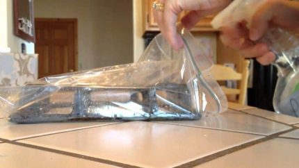 Comment et comment laver la grille de la cuisinière à gaz de la graisse et de la suie: un aperçu des remèdes maison efficaces