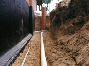 Le dispositif du système de drainage d'une fondation monolithique