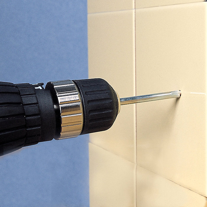 Perceuses à carrelage (31 photos): comment percer des revêtements en céramique et en carrelage, comment percer des carreaux sur un mur