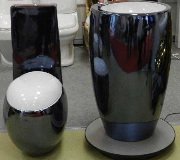 Types de cuvettes de toilettes par caractéristiques techniques et design