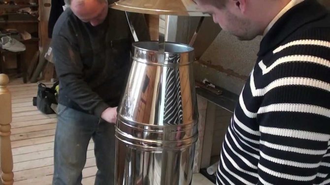 Isolation d'une cheminée extérieure d'un tube sandwich dans un caisson profilé métallique