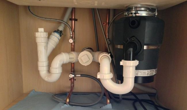 Broyeur de déchets alimentaires pour évier - aperçu de l'équipement et installation à faire soi-même